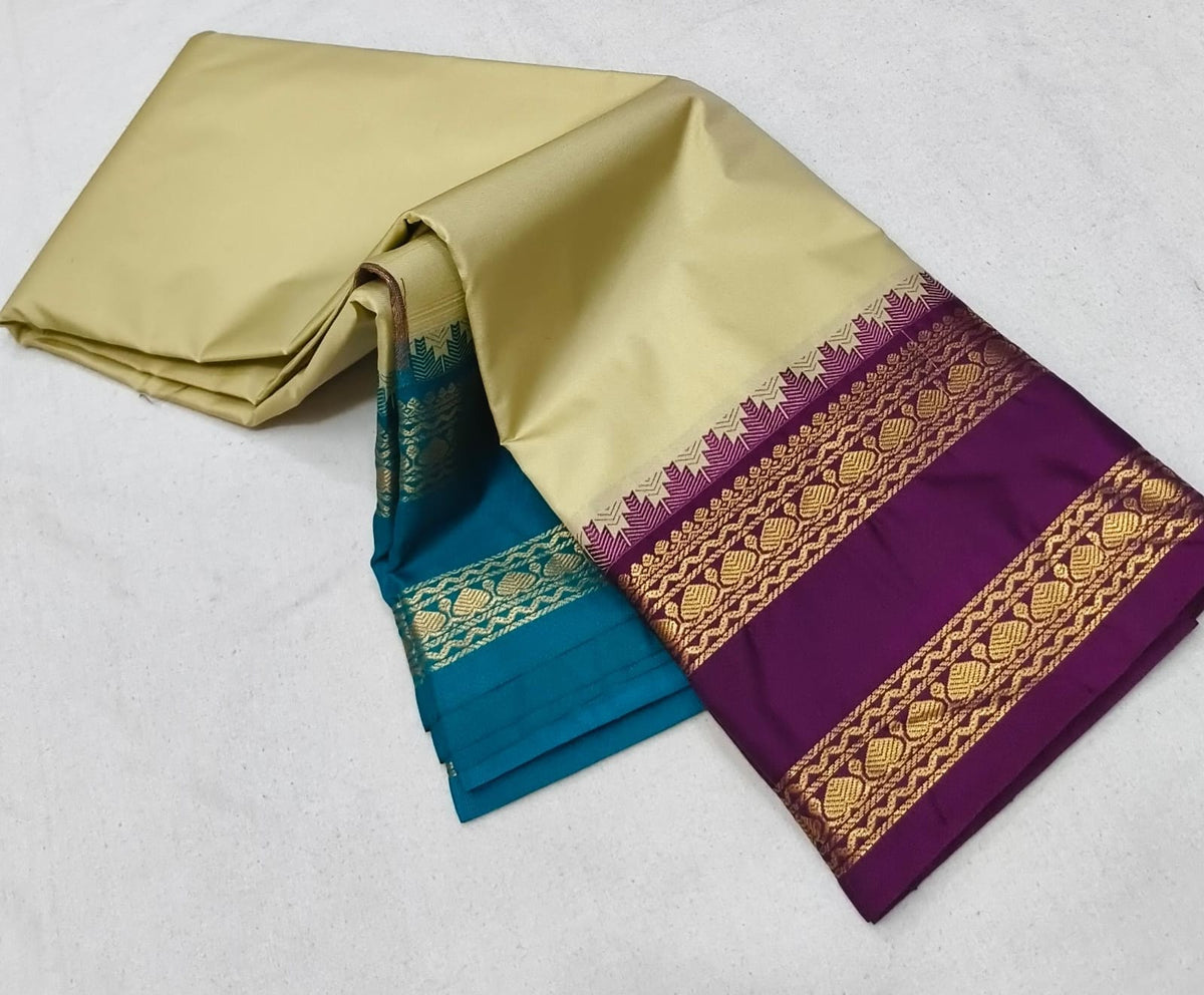 Cream Ganga Jamuna Silk Saree with Teal Blue and magenta combo