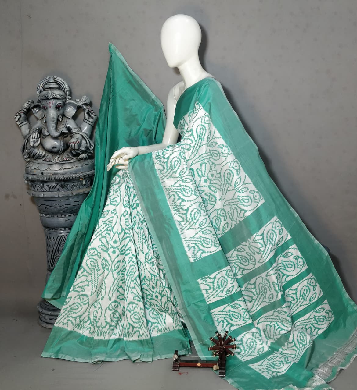 White & Sea Green Handloom Patola Ikkat Silk Saree with Contemporary Woven Motifs