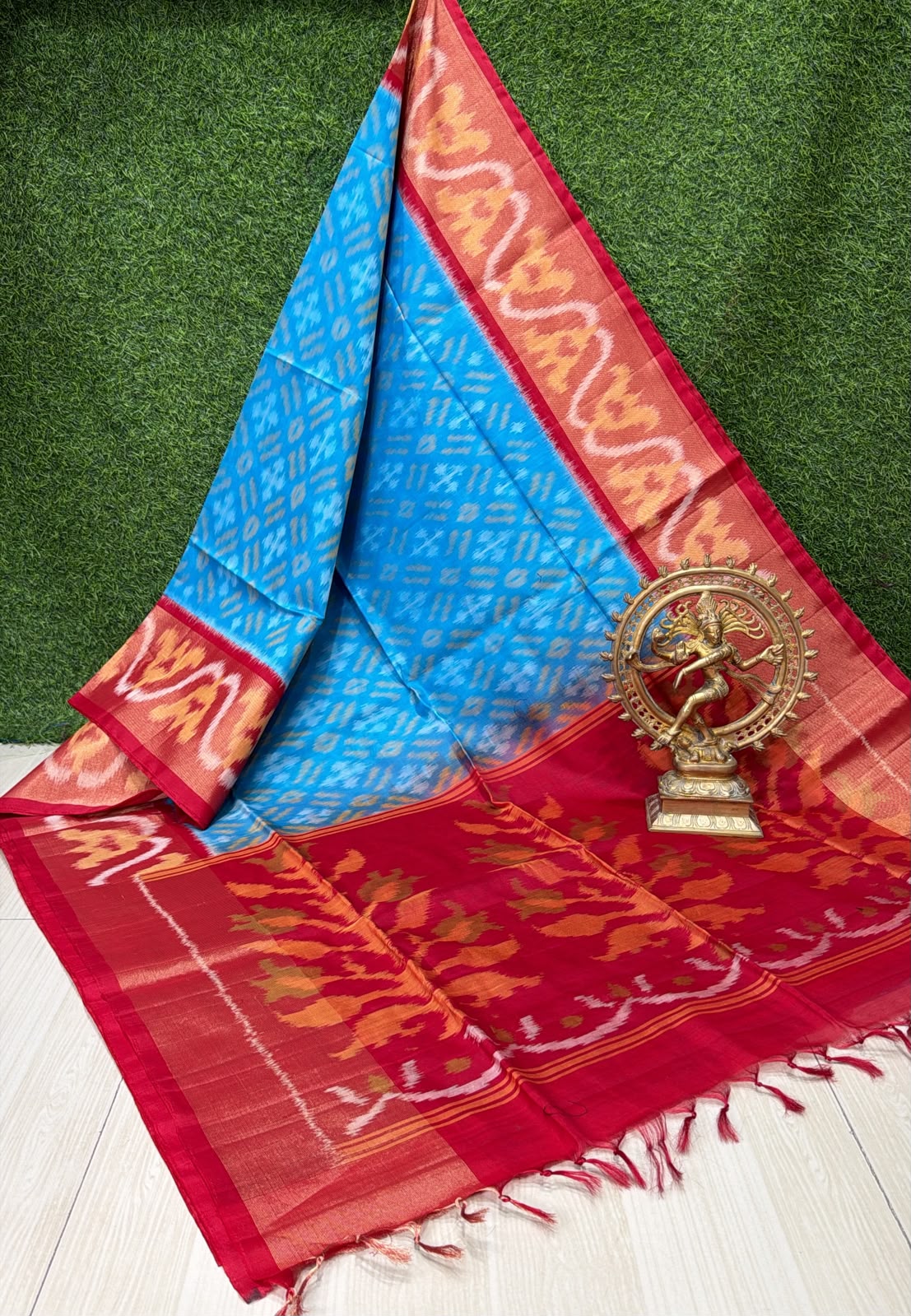 Handloom Ikkat Silk Cotton Saree in vibrant Blue and Crimson Red Border