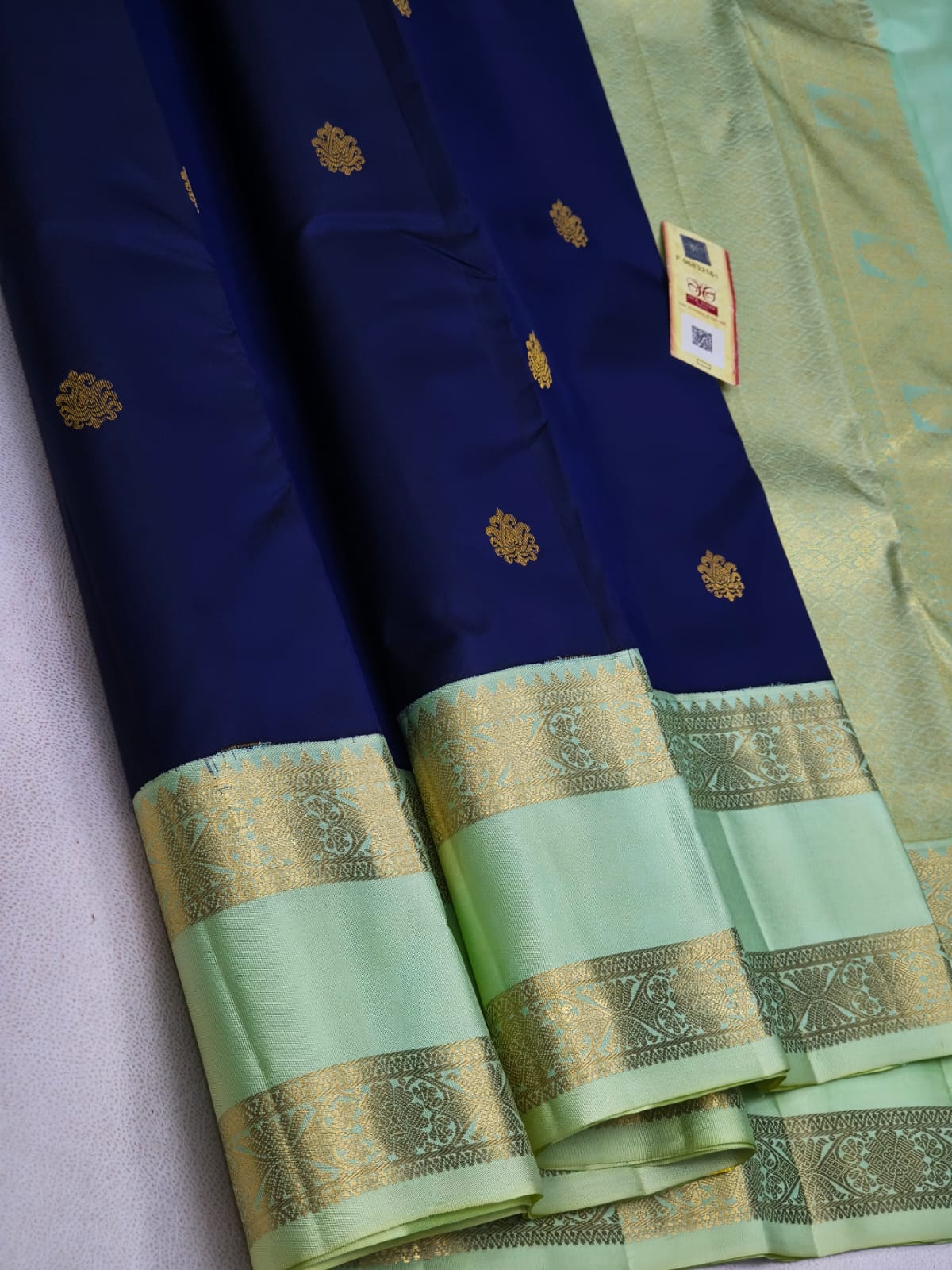 Royal Blue Kanchipuram Silk Saree with Gold Zari Butta & Mint Green Designer Border
