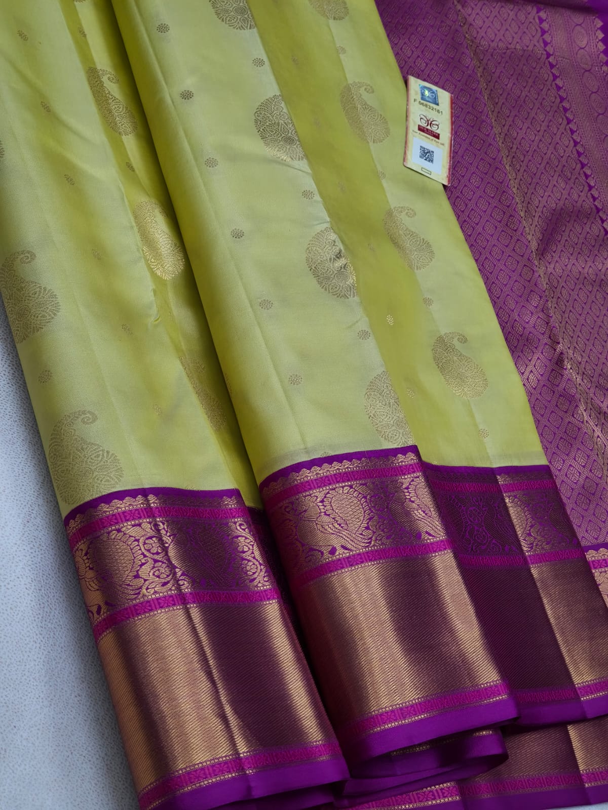 Lime Green Kanchipuram Silk Saree with Purple & Magenta Zari Border