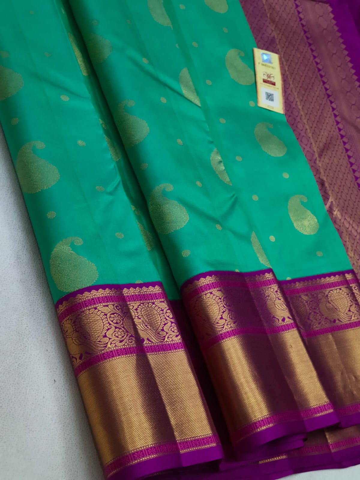 Teal Green Kanchipuram Silk Saree with magenta pink & Gold Zari Border