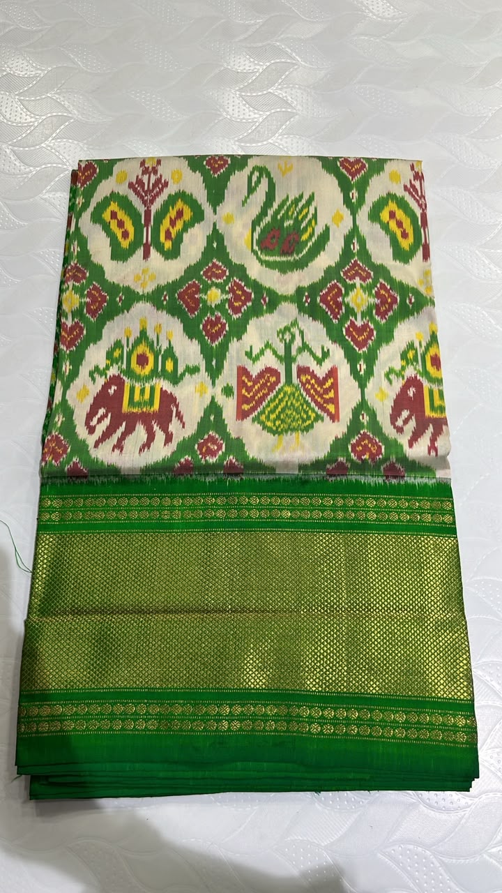Charming Off-White Pochampally Ikat Silk Saree with Traditional Green Kanchi Border