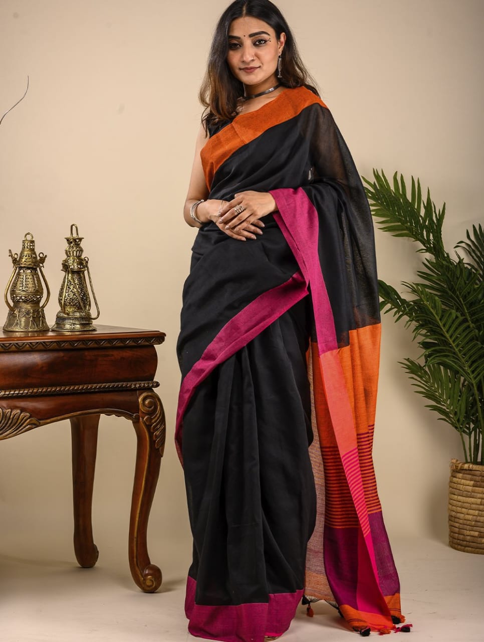 Elegant Jet Black Linen Saree with Orange Contrast Border & Designer Pallu