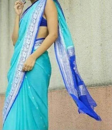 Handloom Banarasi Pure Khaddi Chiffon Saree – Deep Peacock Teal Blue with Silver Zari Paisley Motifs