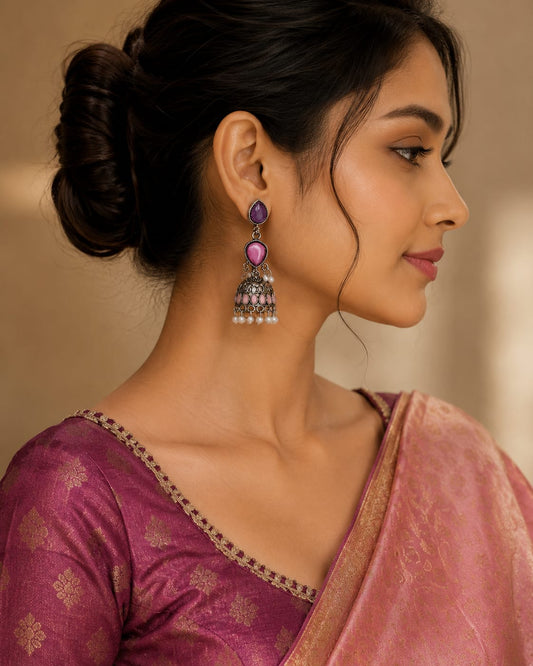 Handcrafted Black Oxidised Silver Tiered Jhumka Earrings with Pink & Purple Stones and Pearl Drops
