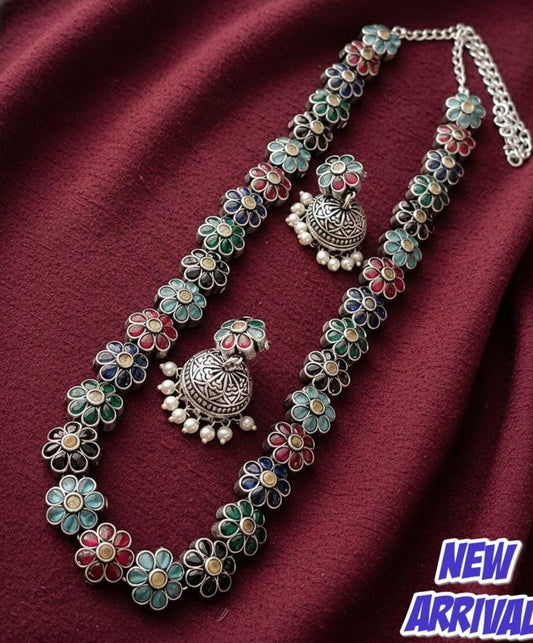 ExquisiteOxidised floral with multi colour stone in silver lookalike and with matching jhumki