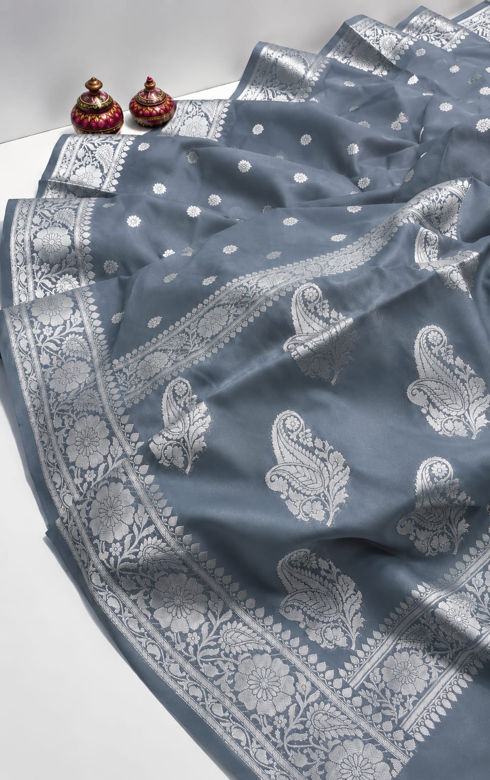Elegant Grey Banarasi Silk Saree with Silver Zari Floral and Paisley Border