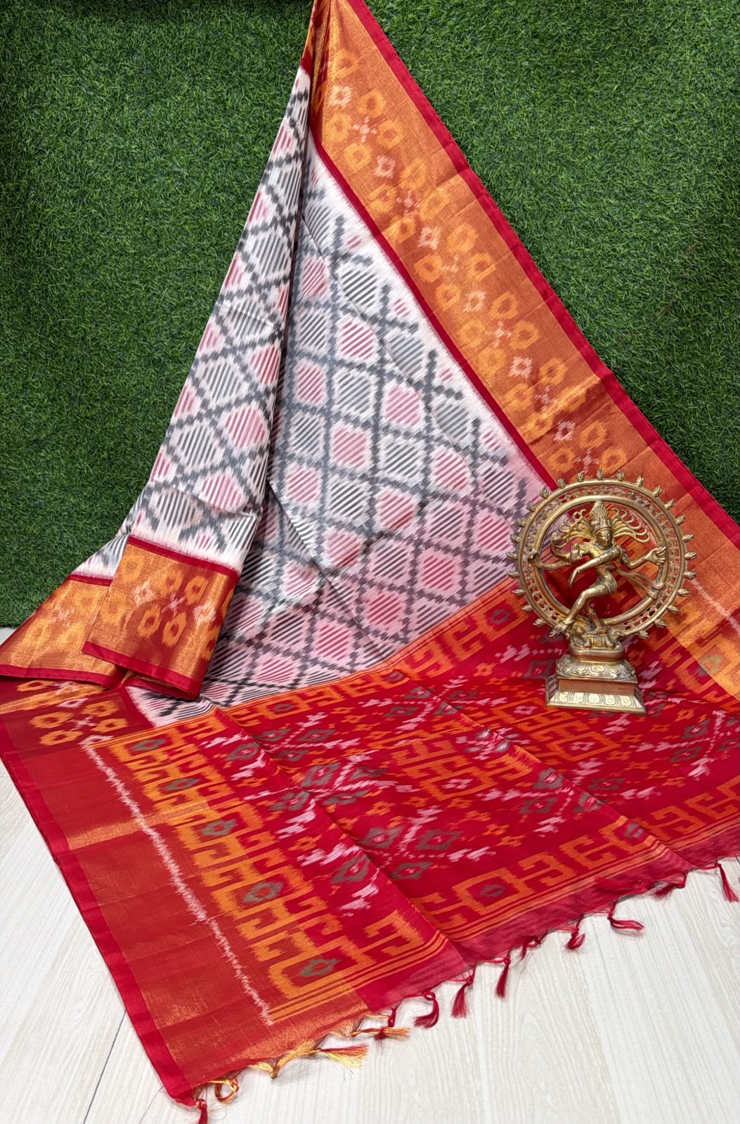 Handloom Ikkat Silk Cotton Saree with patterned Off-White and Crimson Red Border