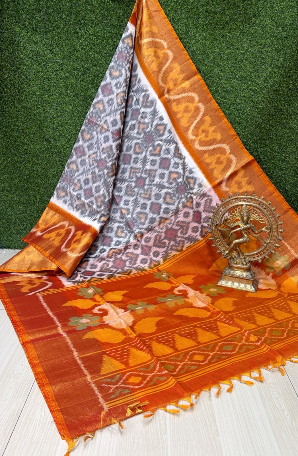Handloom Ikkat Silk Cotton Saree Grey  and Mustard Orange Border