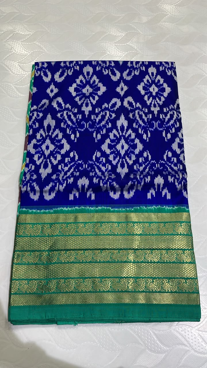 Pochampally Ikkat Silk Saree in Royal Blue with White and Teal Green Kanchi Border