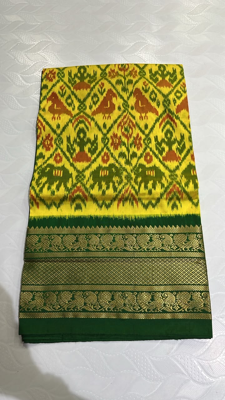 Pochampally Ikkat Silk Saree in Bright Yellow with Green and Rusts and Rich Green Kanchi Border