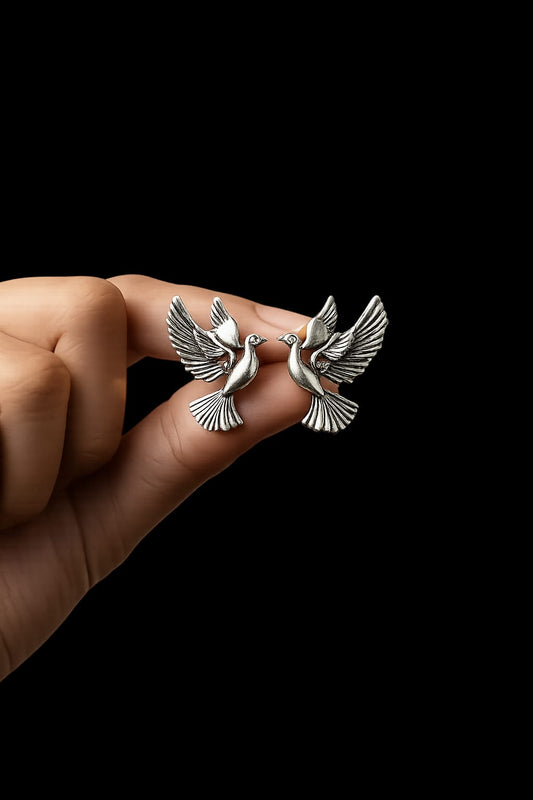 Oxidised german silver flying bird earrings