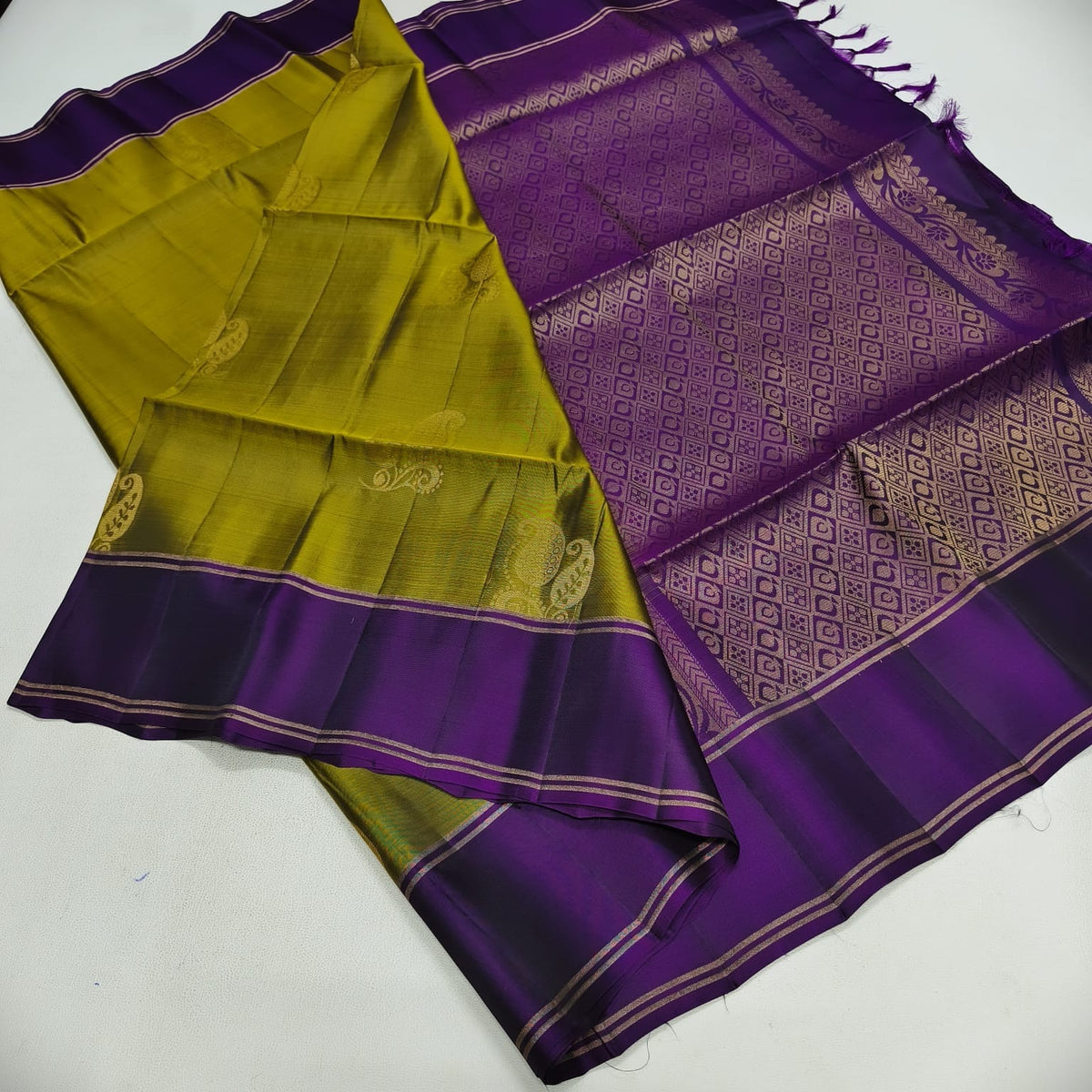 Emerald Grace Semi Silk Saree with Olive Green And Dark Purple Contrast Border & Rich Woven Pallu
