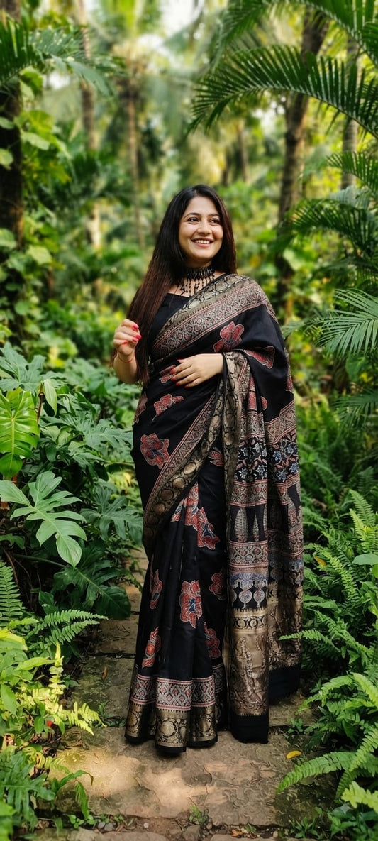 Pure Dola Silk Ajrakh Natural Hand Block Printed Saree in Midnight Black with Bold Floral Motifs & Woven Zari Border