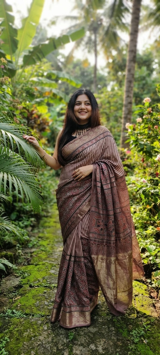 Pure Dola Silk Ajrakh Natural Hand Block Printed Saree in Dusty Rose & Mauve with Trellis Pleats and Woven Gold Zari Border