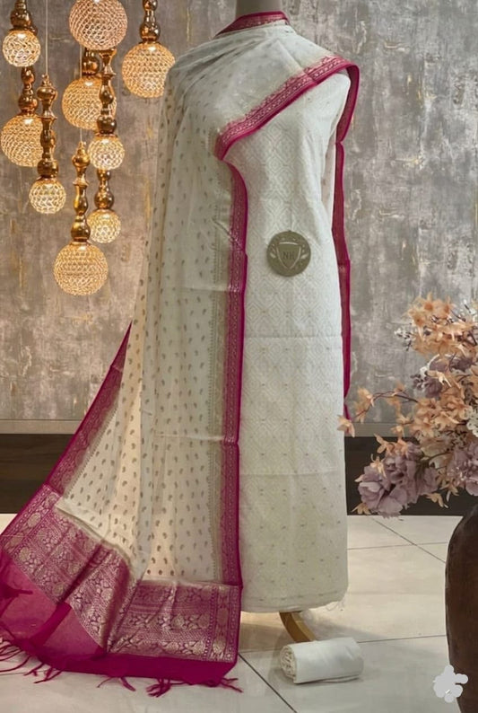 Exclusive Banarasi Mercerised Unstitched Salwar Kameez– Off-White & Magenta/Pink Border Resham Weaving with Lurex Dupatta